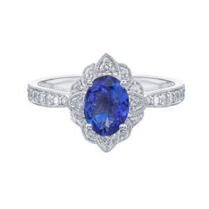 Oval-shaped gemstone ring with diamond halo @ Colours by Karat